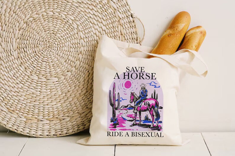 save a horse ride a bisexual tote bag