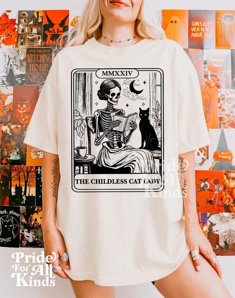 The childless cat lady tarot | kamala harris tarot | feminist halloween | childless cat lady for kamala | read banned books | cat skeleton