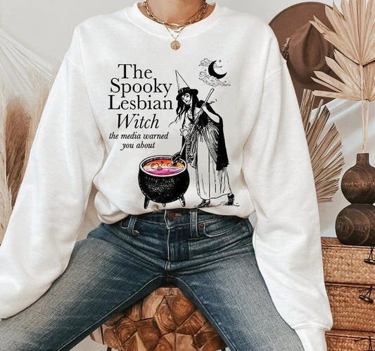 The spooky lesbian witch the media warned you about sweatshirt