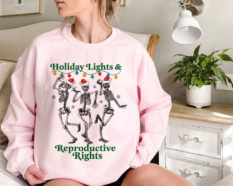 Holiday lights and reproductive rights sweatshirt