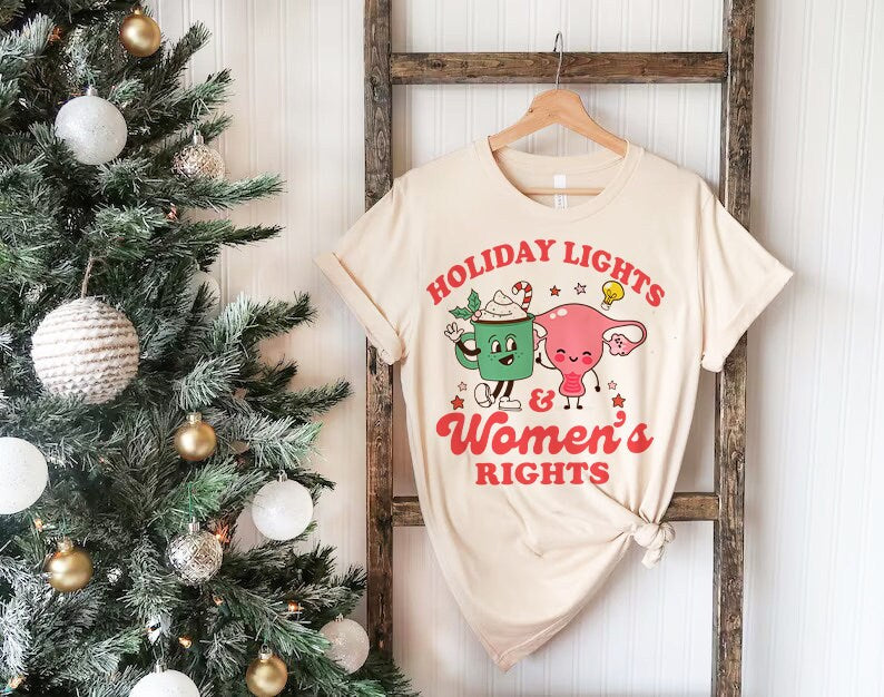 Holiday lights and women's rights shirt