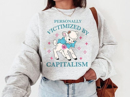 Personally victimized by capitalism sweatshirt