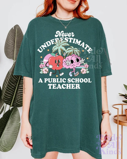 Never underestimate a public school teacher | tim walz | kamala harris walz | harris walz tshirt | teachers for kamala | fund public schools